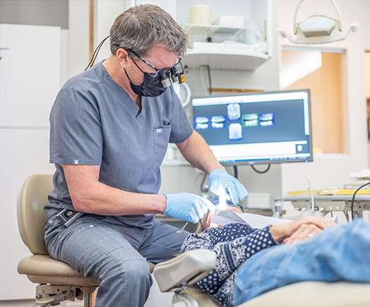 Close up of dental patient getting cosmetic dental bonding