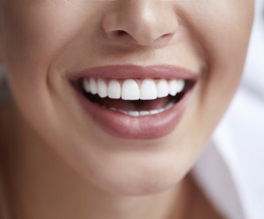 Close up of smile with straight white teeth