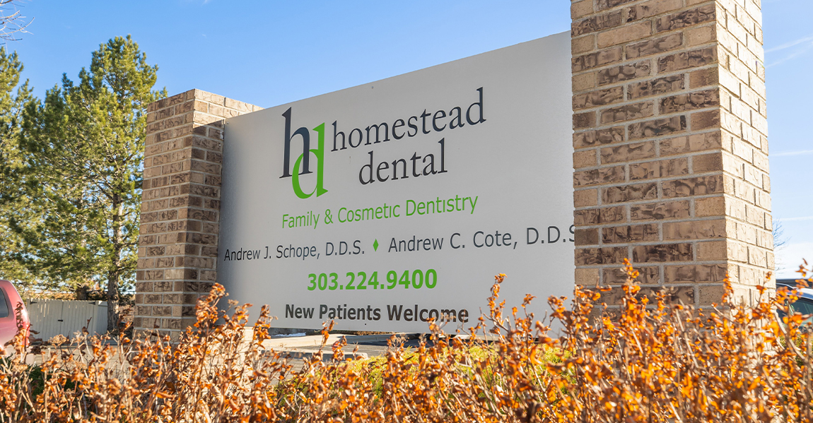 Homestead Dental sign outside of dental office